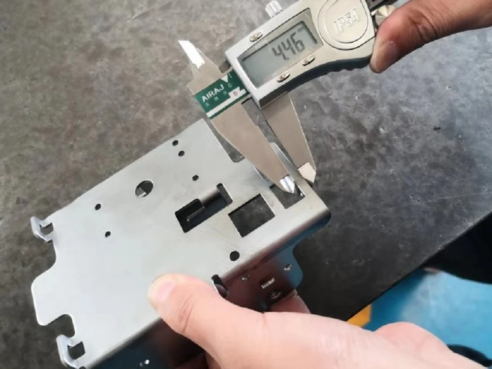 1. Inspection of stainless steel bracket.jpg